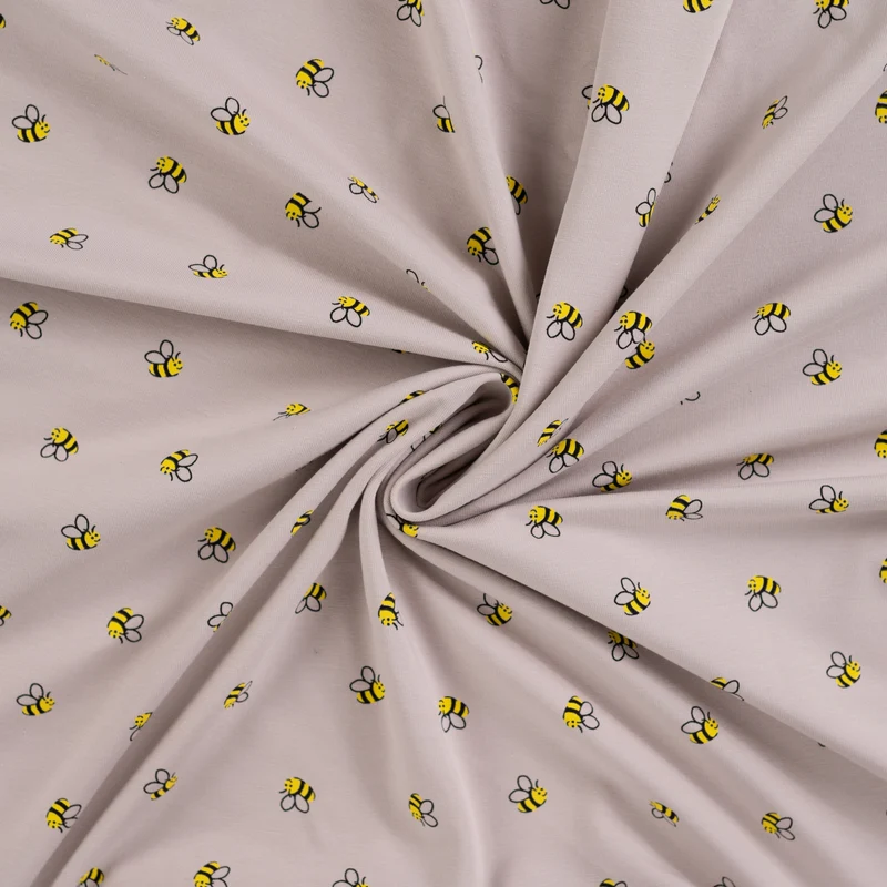 Baumwolljersey Bienen beige *Ab 50 cm