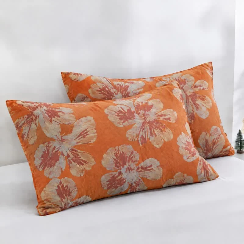 Wendbare Baumwolldecke mit orange-blauem Blumenmuster