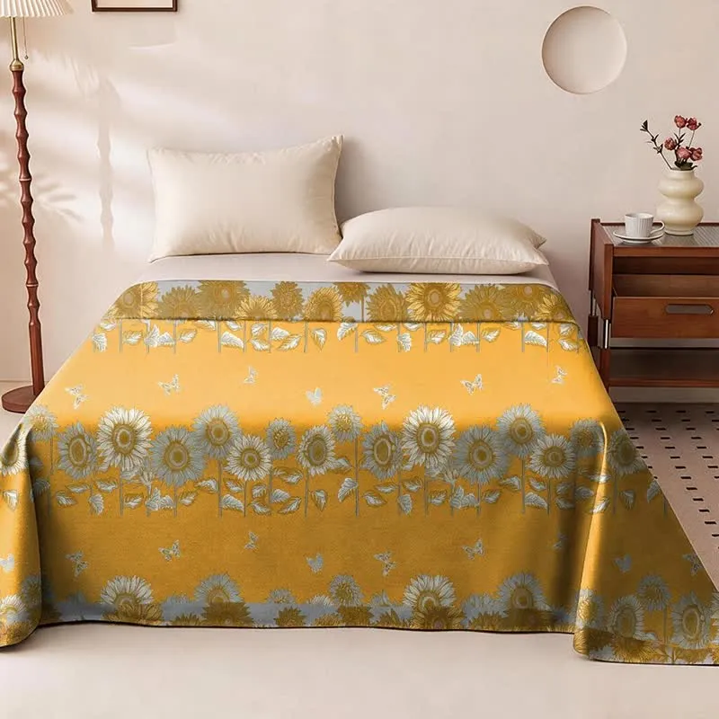 Wendbare Tagesdecke aus Baumwollgaze mit Sonnenblumen- und Schmetterlingsmotiven