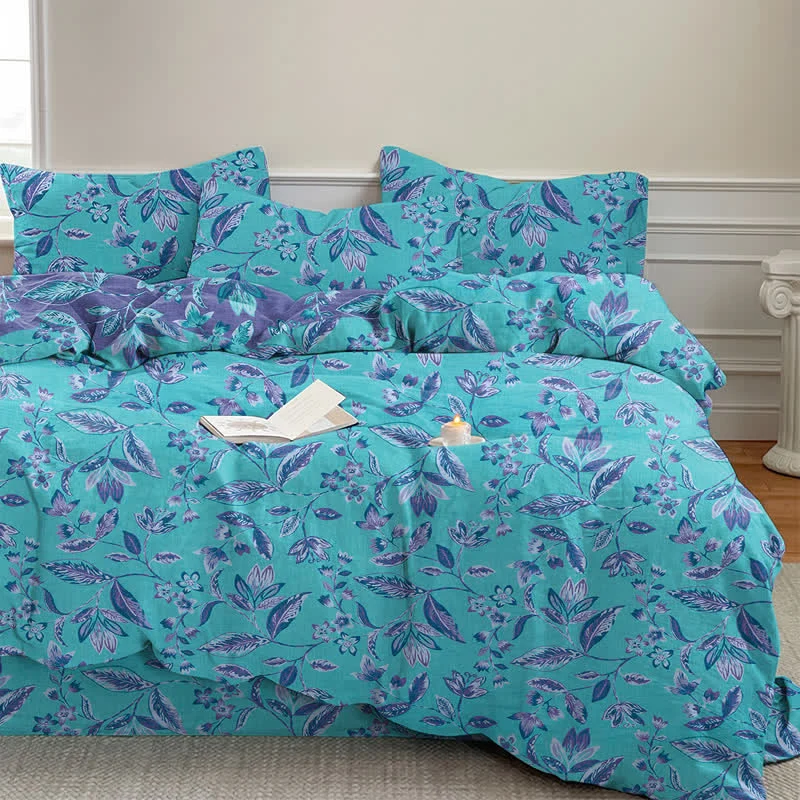 Bettwäsche-Set aus Baumwolle mit blauem und violettem Blattmuster