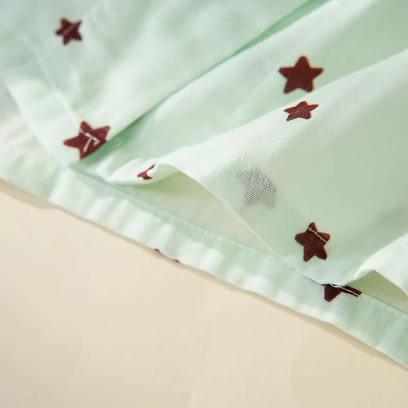 Baumwollpyjama mit pastellfarbenem Sternenmuster und langen Ärmeln