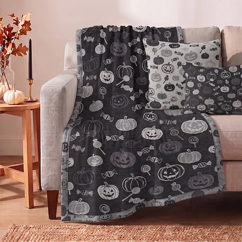 Schwarze Halloween-Kürbis-Süßigkeiten-Baumwolldecke