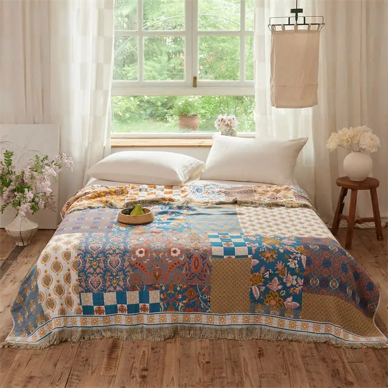 Wendbare Boho-Patchwork-Musselindecke