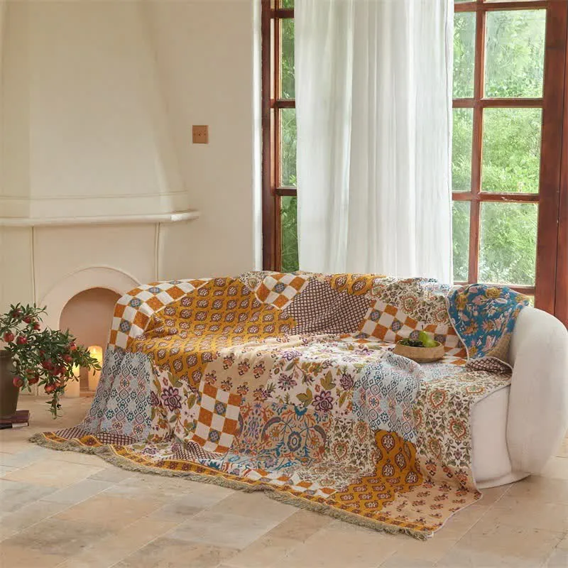 Wendbare Boho-Patchwork-Musselindecke