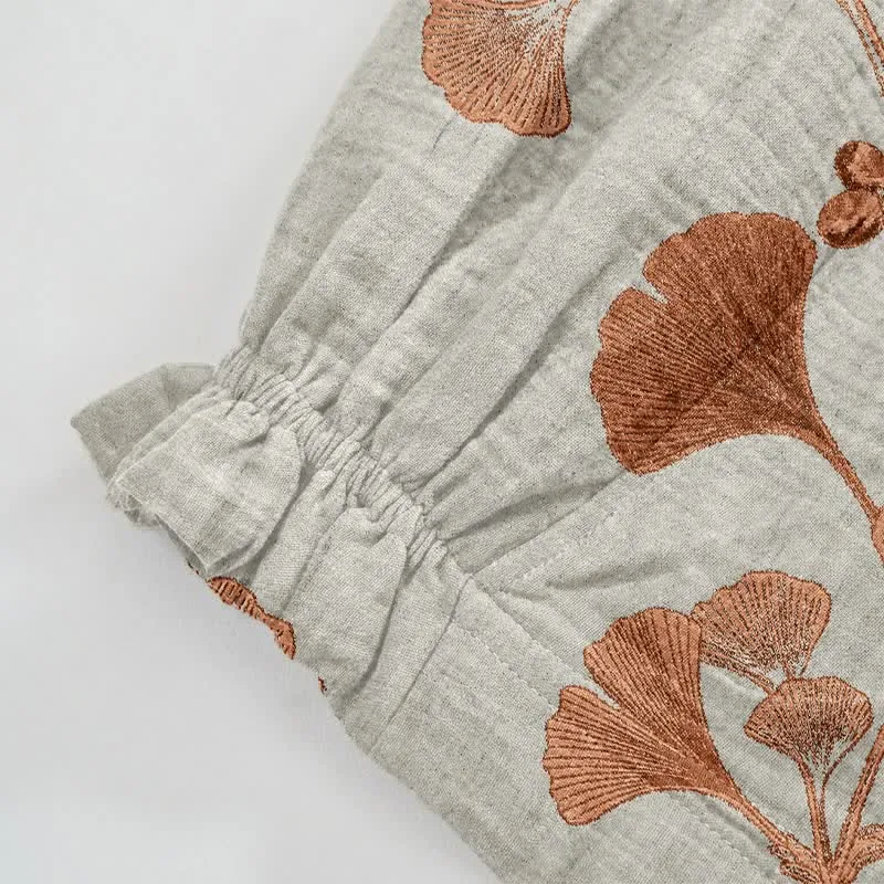 Beigefarbene Loungehose aus Baumwolle mit Rostmuster und Ginkgoblattmuster