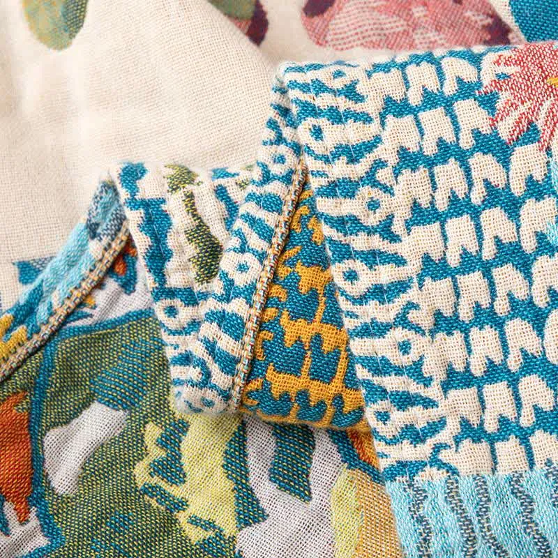 Sofadecke aus Baumwollgaze mit künstlerischem Patchwork-Blumenmuster
