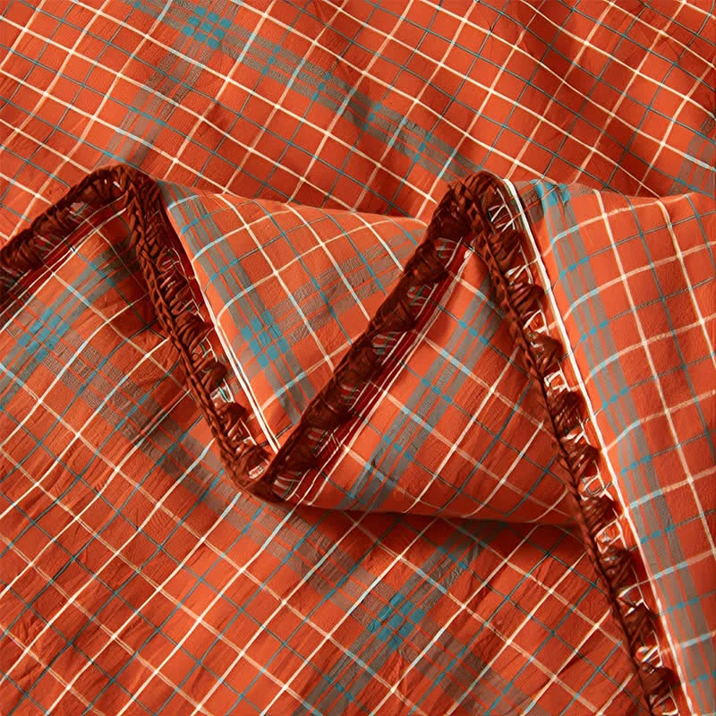 Sommerdecke aus garngefärbter, orange karierter Baumwolle
