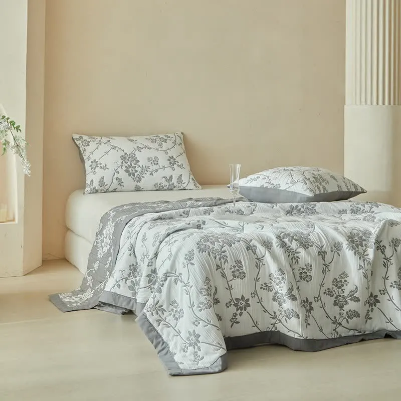 Wendebettwäsche-Set mit Zweig- und Blumenmuster