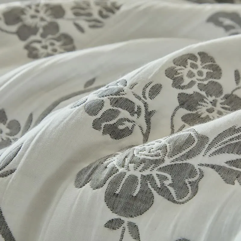 Wendebettwäsche-Set mit Zweig- und Blumenmuster