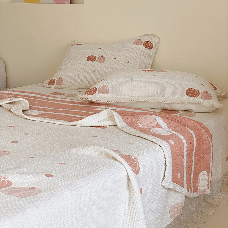Sommerdecke aus gestepptem Lyocell in Creme-Kürbis-Optik