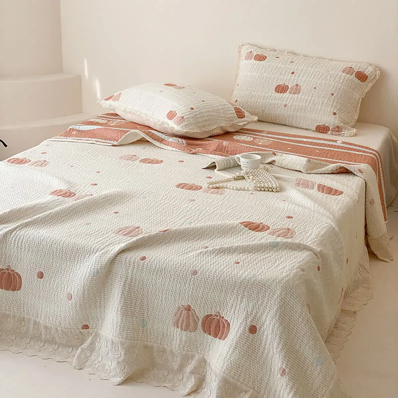 Sommerdecke aus gestepptem Lyocell in Creme-Kürbis-Optik