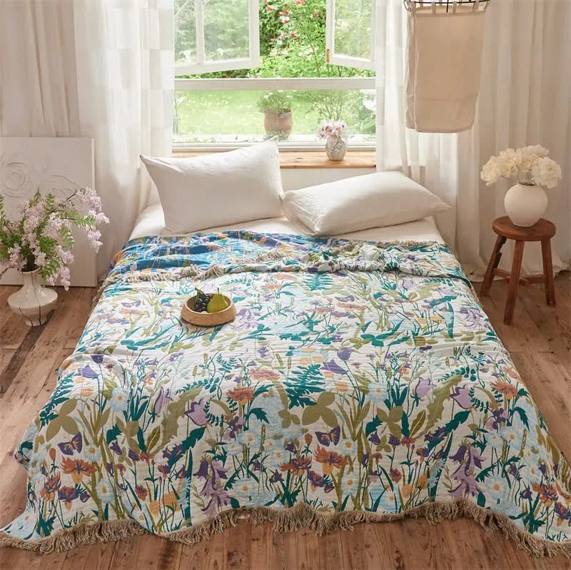 Wendbare Musselin-Decke mit botanischem Quastenmuster