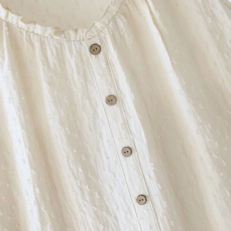 Beigefarbenes, strukturiertes, ärmelloses Loungekleid aus Baumwolle