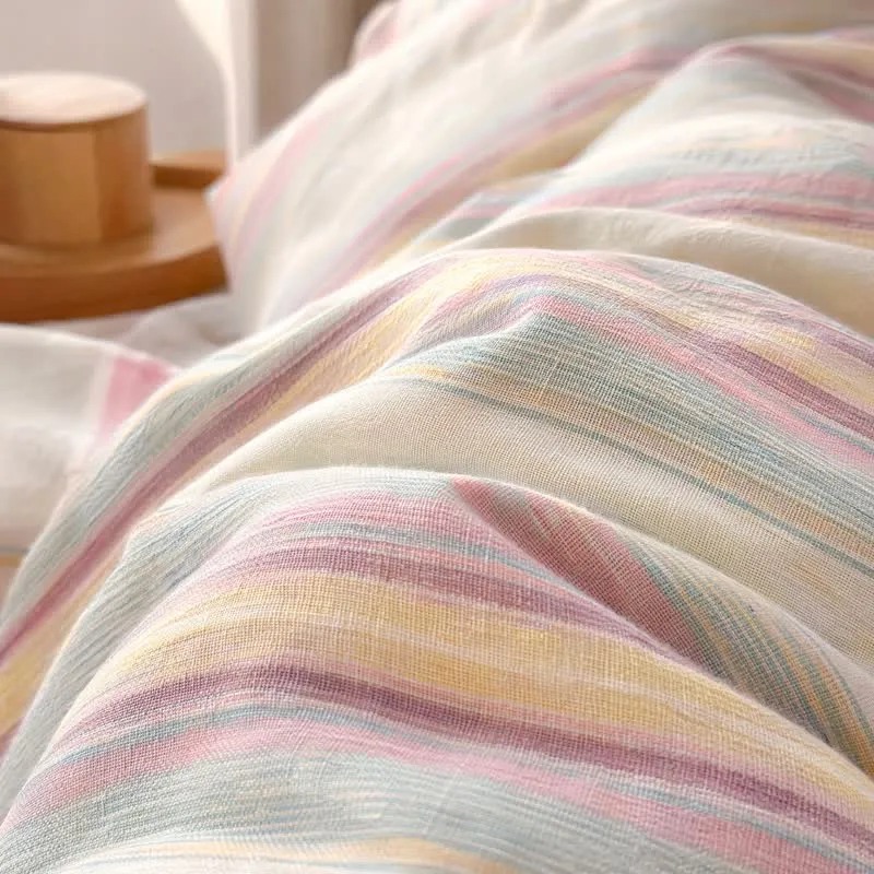 Bettwäsche-Set aus Baumwolle mit weichen, pastellfarbenen Streifen in verschiedenen Farben