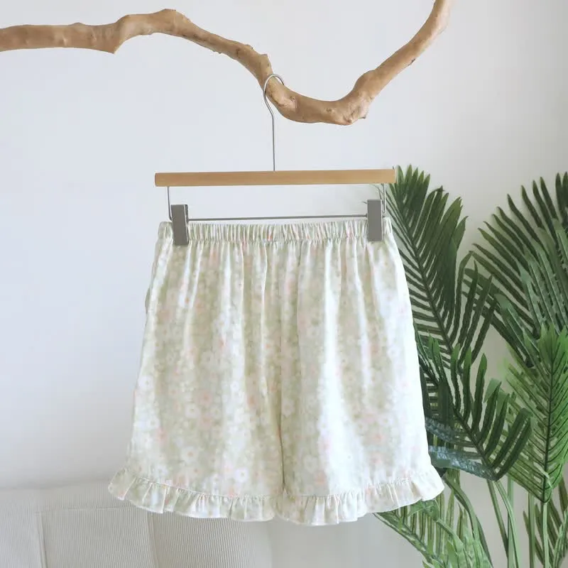 Grüne Pyjama-Shorts aus Baumwolle mit Blumenmuster und Rüschen