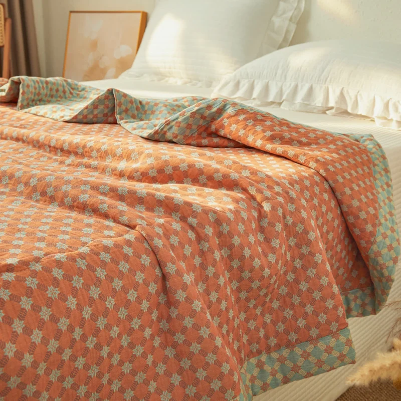 Wende-Steppdecke aus garngefärbtem Jacquard-Musselin