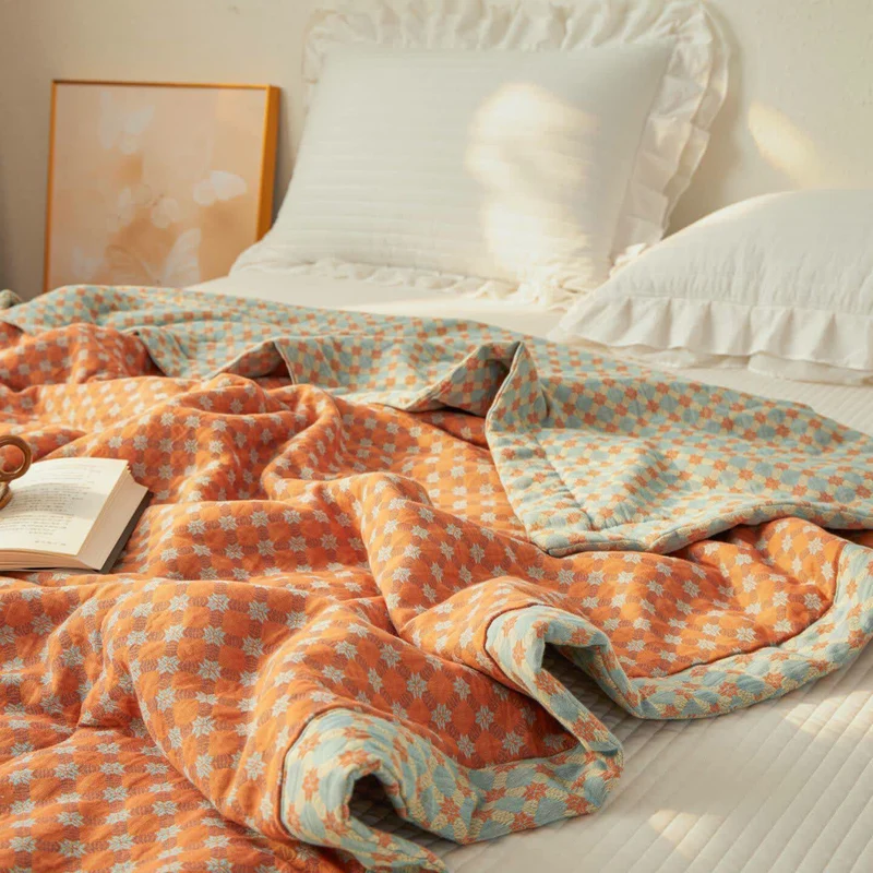 Wende-Steppdecke aus garngefärbtem Jacquard-Musselin