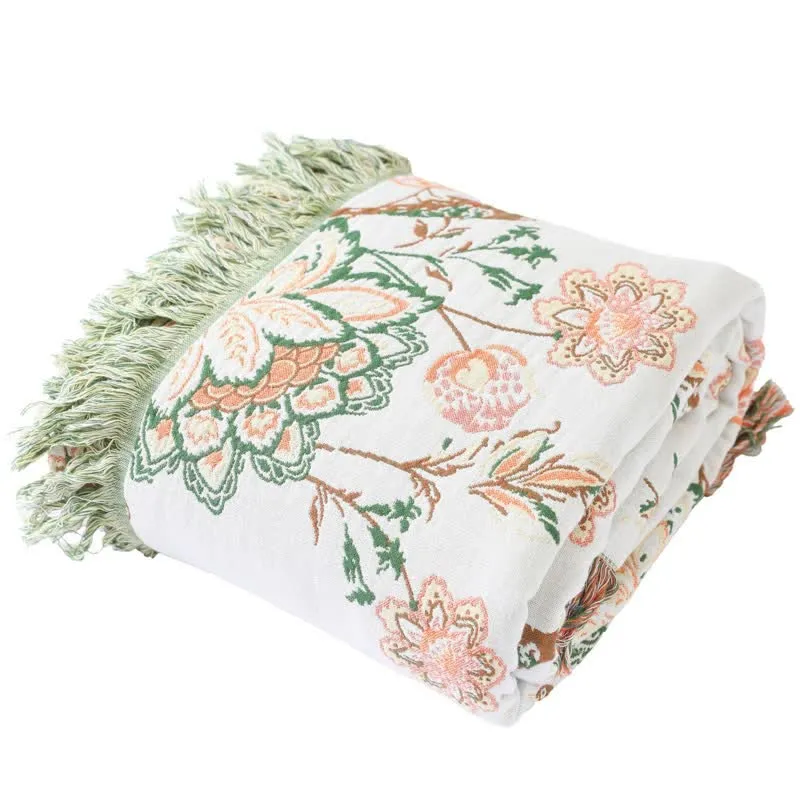 Wende-Steppdecke aus Baumwolle mit Quasten und Blumenmuster