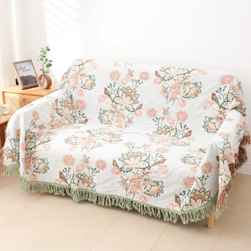 Wende-Steppdecke aus Baumwolle mit Quasten und Blumenmuster