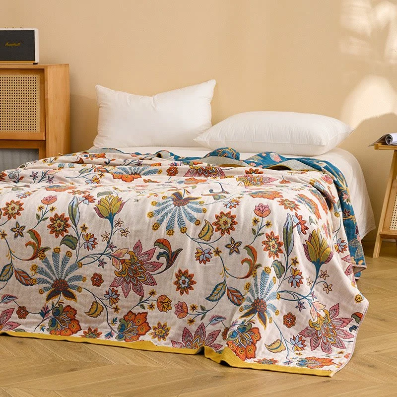 Wendbare Steppdecke aus Baumwollgaze mit Blumenmuster