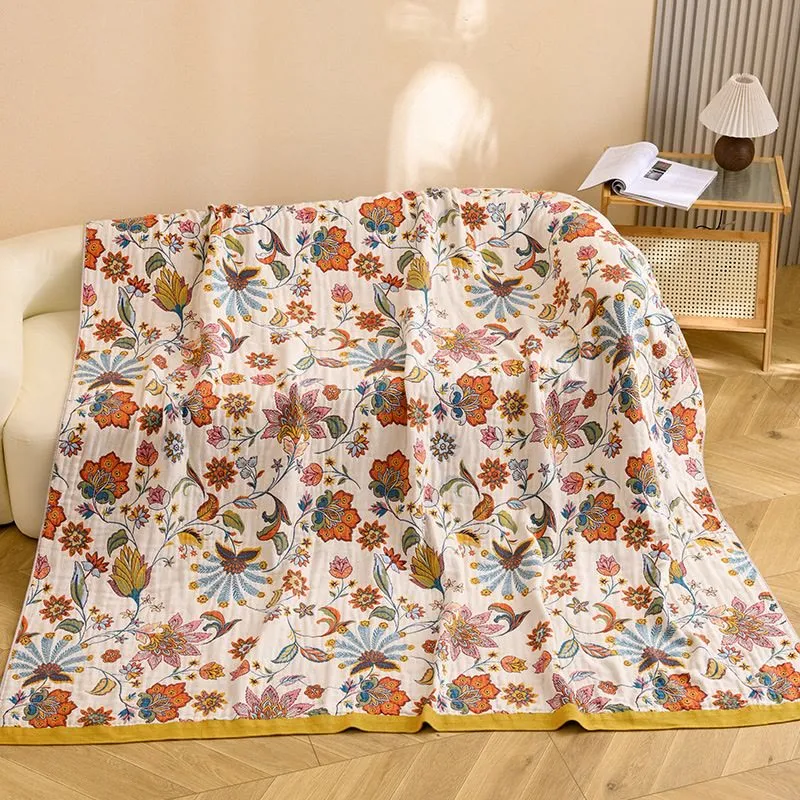 Wendbare Steppdecke aus Baumwollgaze mit Blumenmuster