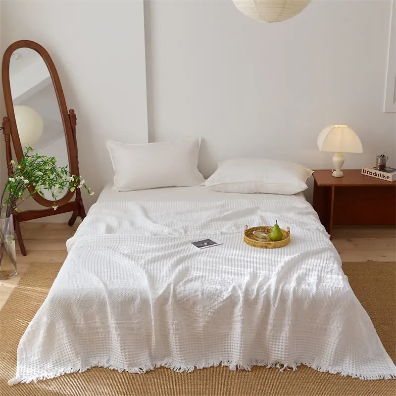 Steppdecke aus Baumwolle mit Waffelpiqué-Muster und Quasten