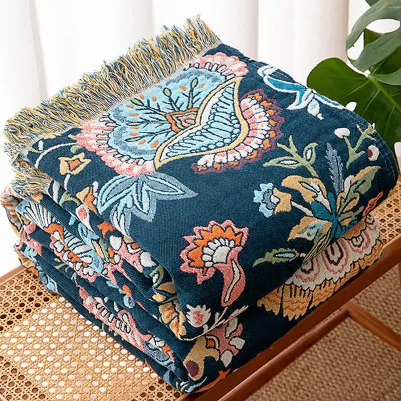 Boho-Sofadecke aus Baumwolle mit Blumenmuster und Quasten