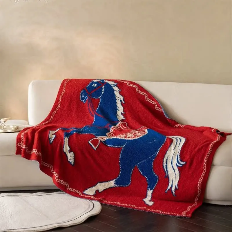 Festliche Strickdecke mit Pferdemotiv
