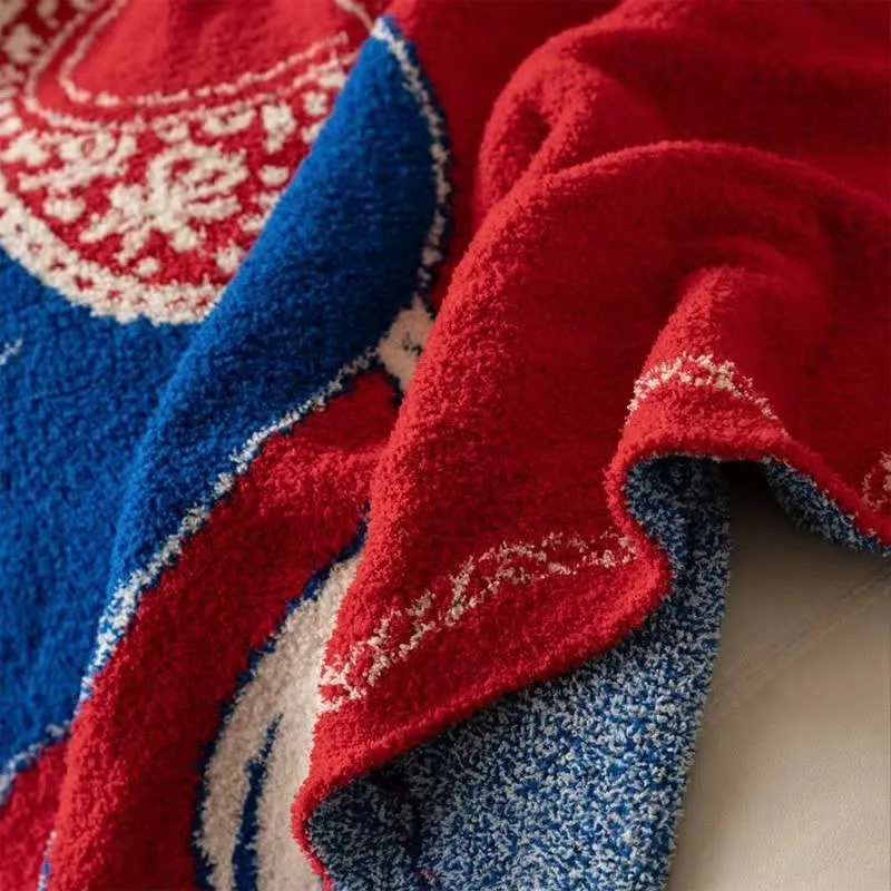 Festliche Strickdecke mit Pferdemotiv
