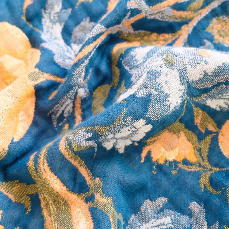 Bunte Sofadecke aus Baumwolle mit Blumen-, Vogel- und Quastenmuster