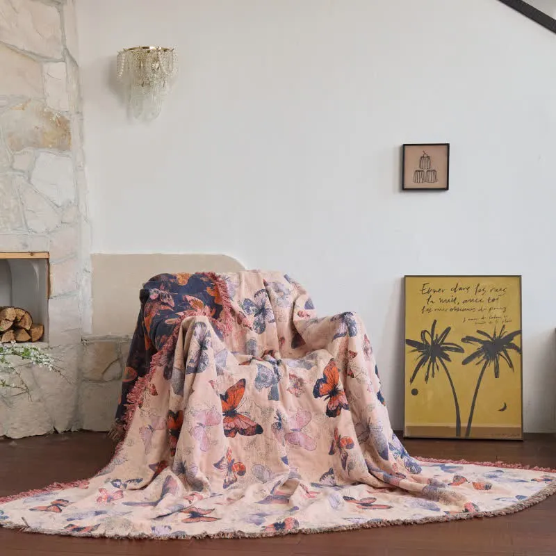 Elegante Sofadecke aus Baumwolle mit Schmetterlingsquasten