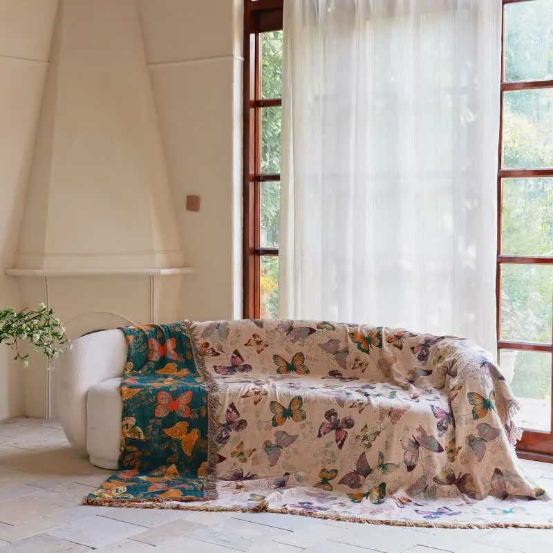 Elegante Sofadecke aus Baumwolle mit Schmetterlingsquasten