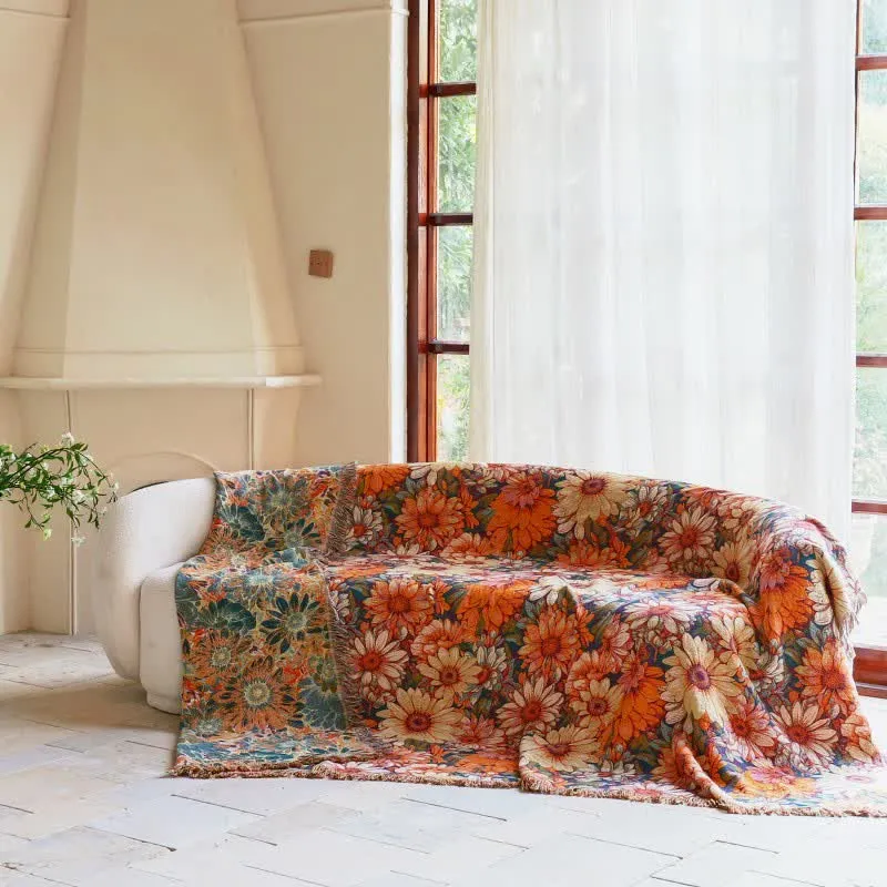 Sofadecke aus Baumwolle mit Sonnenblumenmuster und Quasten