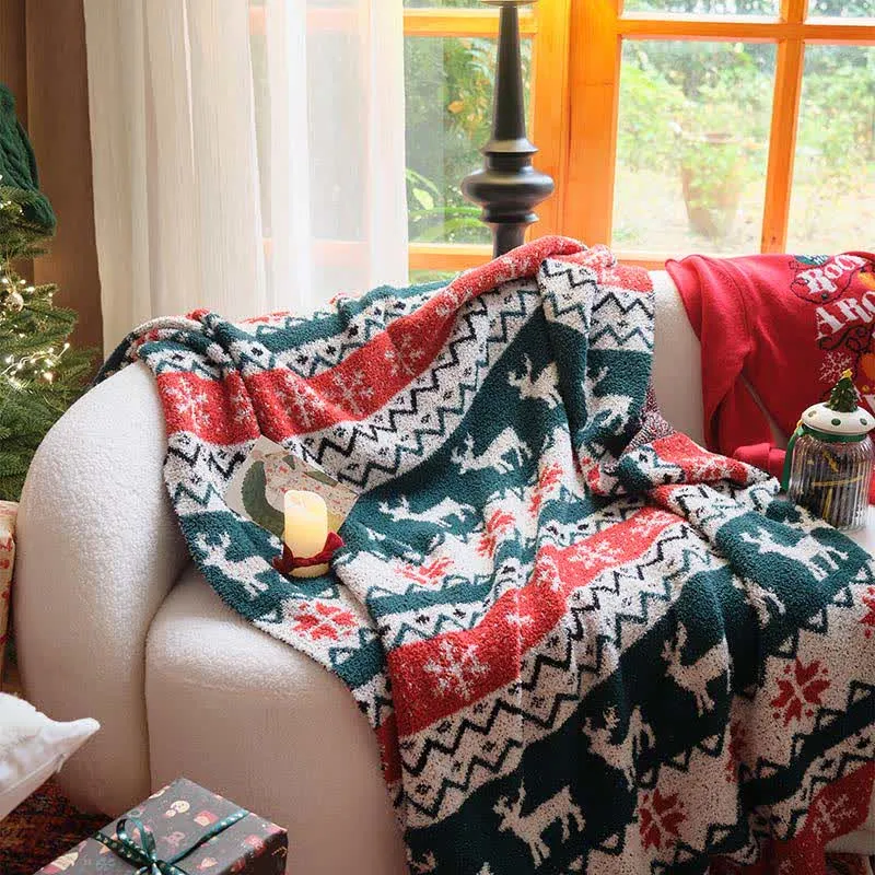 Weihnachtsdecke mit Rentiermotiv im Fair-Isle-Stil