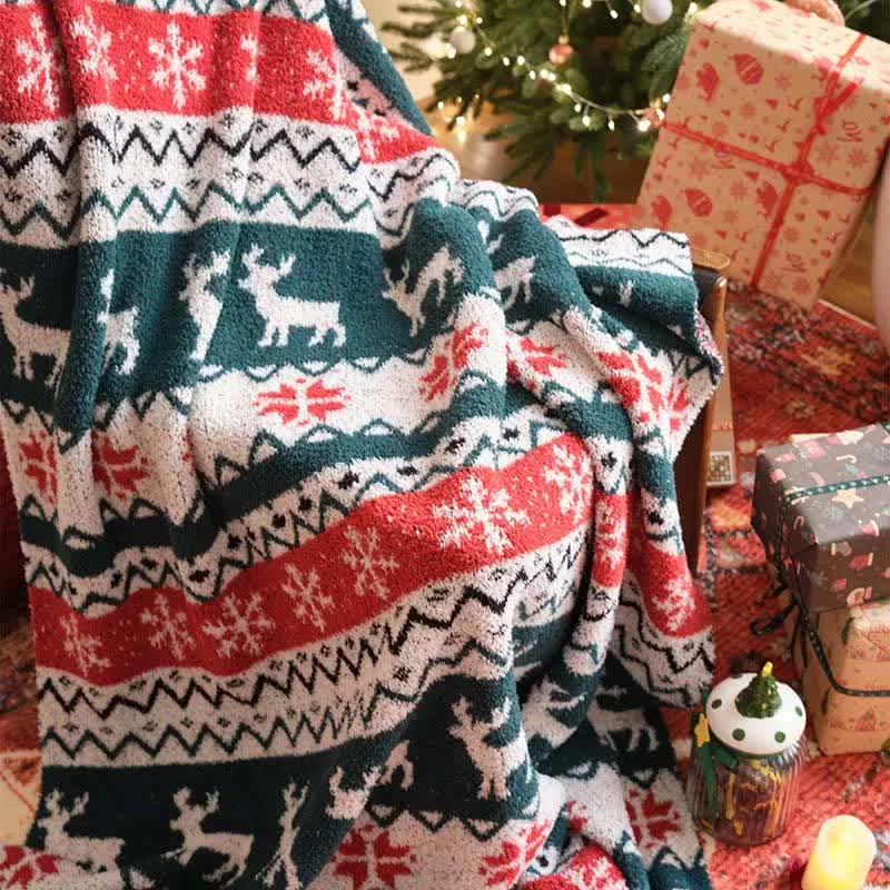 Weihnachtsdecke mit Rentiermotiv im Fair-Isle-Stil
