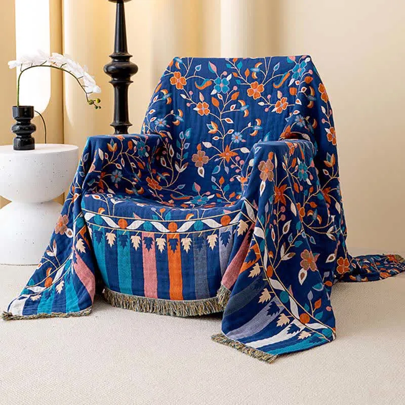 Wendesteppdecke aus Baumwolle mit Vintage-Blumenmuster und Quasten
