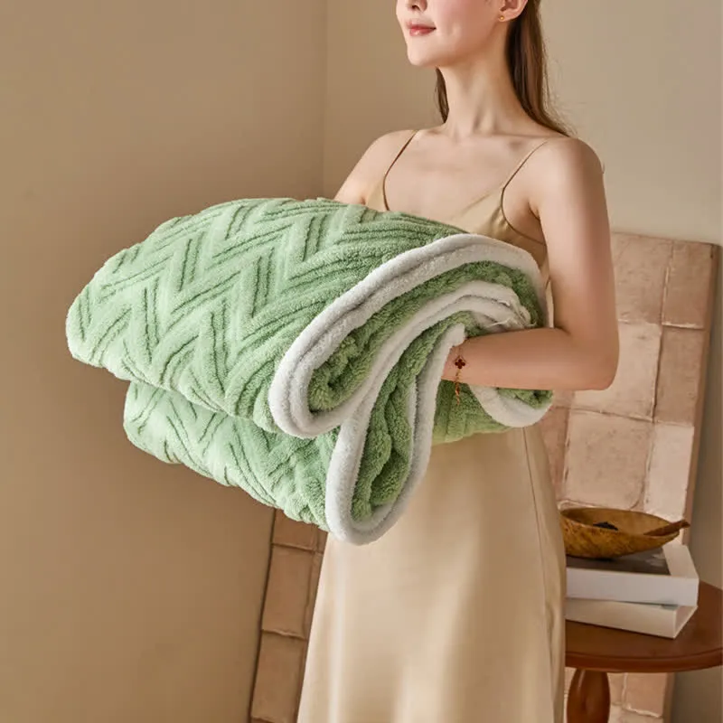 Moderne warme Jacquarddecke mit Chevron-Muster