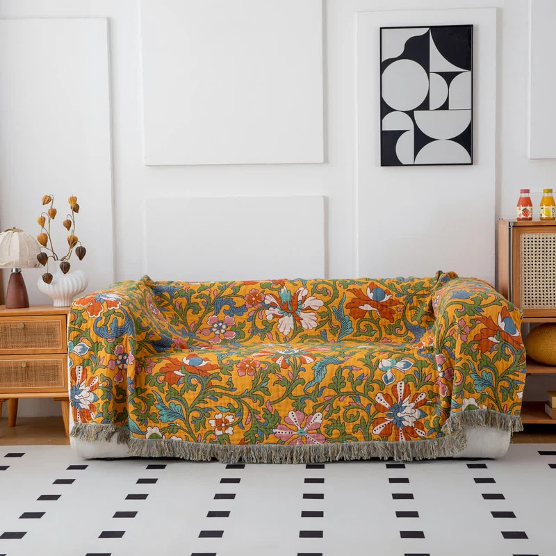 Sofadecke aus Baumwolle mit Vintage-Blumenmuster und Quasten