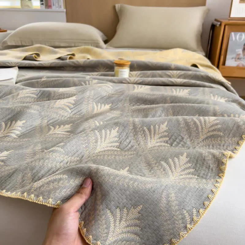 Wendbare Tagesdecke aus Baumwollgaze mit Kiefernzweigen