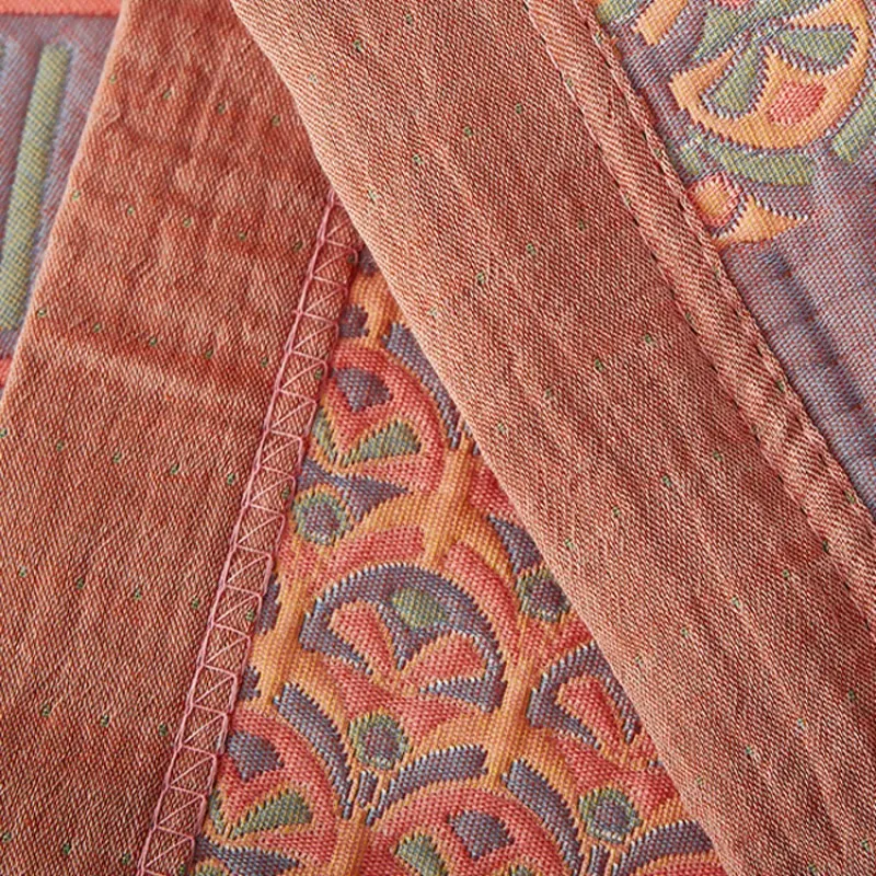 Bunte Wendesteppdecke aus Baumwolle mit quadratischem Muster