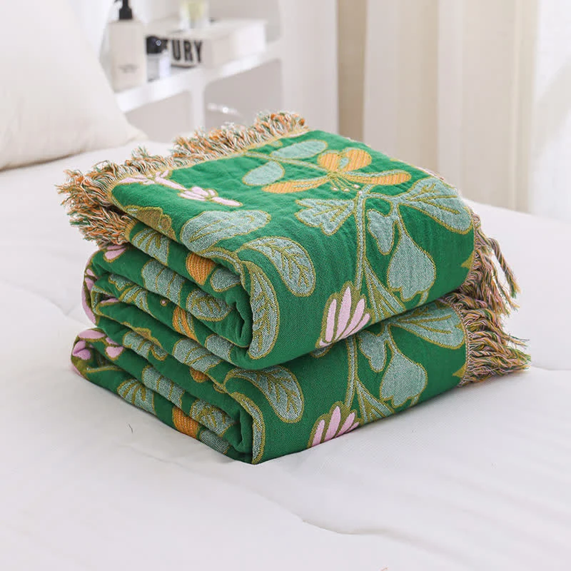 Sofadecke aus Baumwollgaze mit Blumenquasten