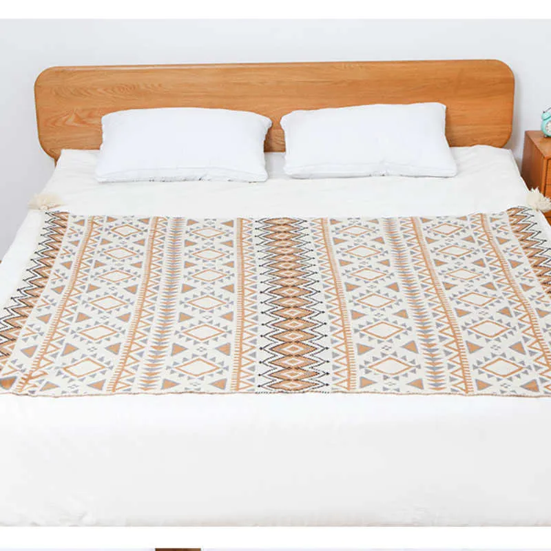 Ownkoti Gemütliche Strickdecke mit Quastenmuster
